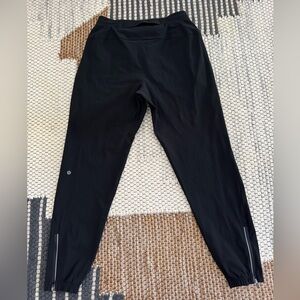 Men’s medium Lululemon Black Surge Jogger in like-new condition.